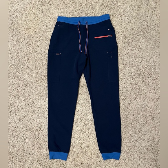 DOLAN Scrubs - Hope 11-Pocket Scrub Jogger Pant
Medium / Tall / Navy Colorblock - Picture 2 of 5